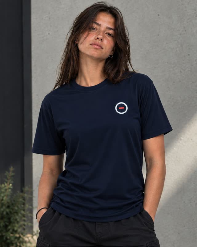 The athletic navy tee, front view, the small ORU mark on the chest